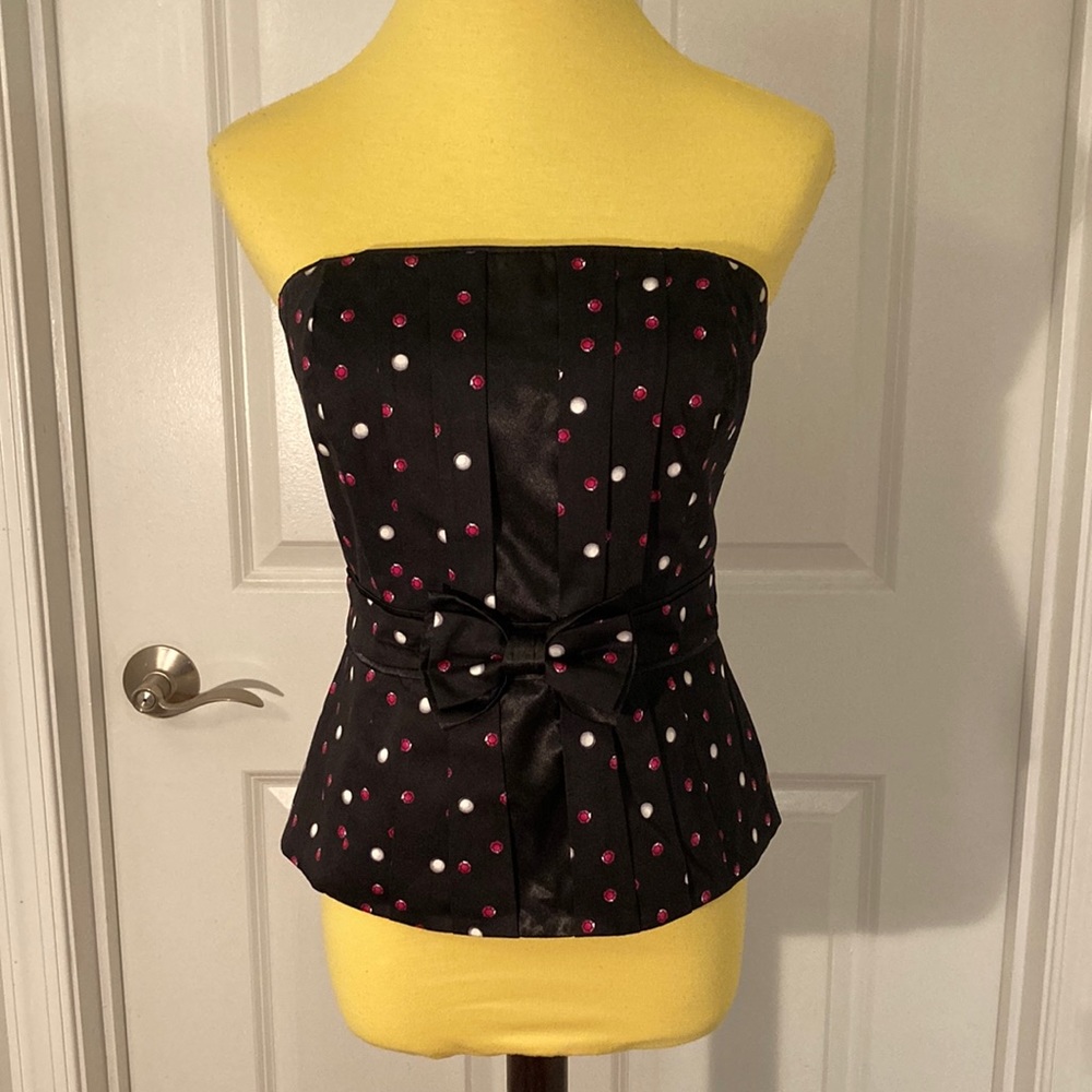 Stunning bustier top in black with pink polka dots